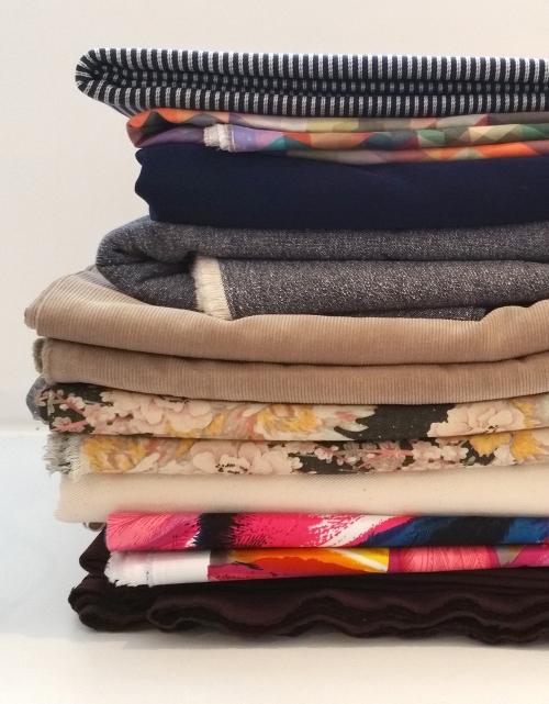 pile of folded fabrics